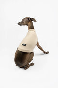 A back photo of an Italian Greyhound wearing a beige waffle jersey tank top by Strela Studio on a white background