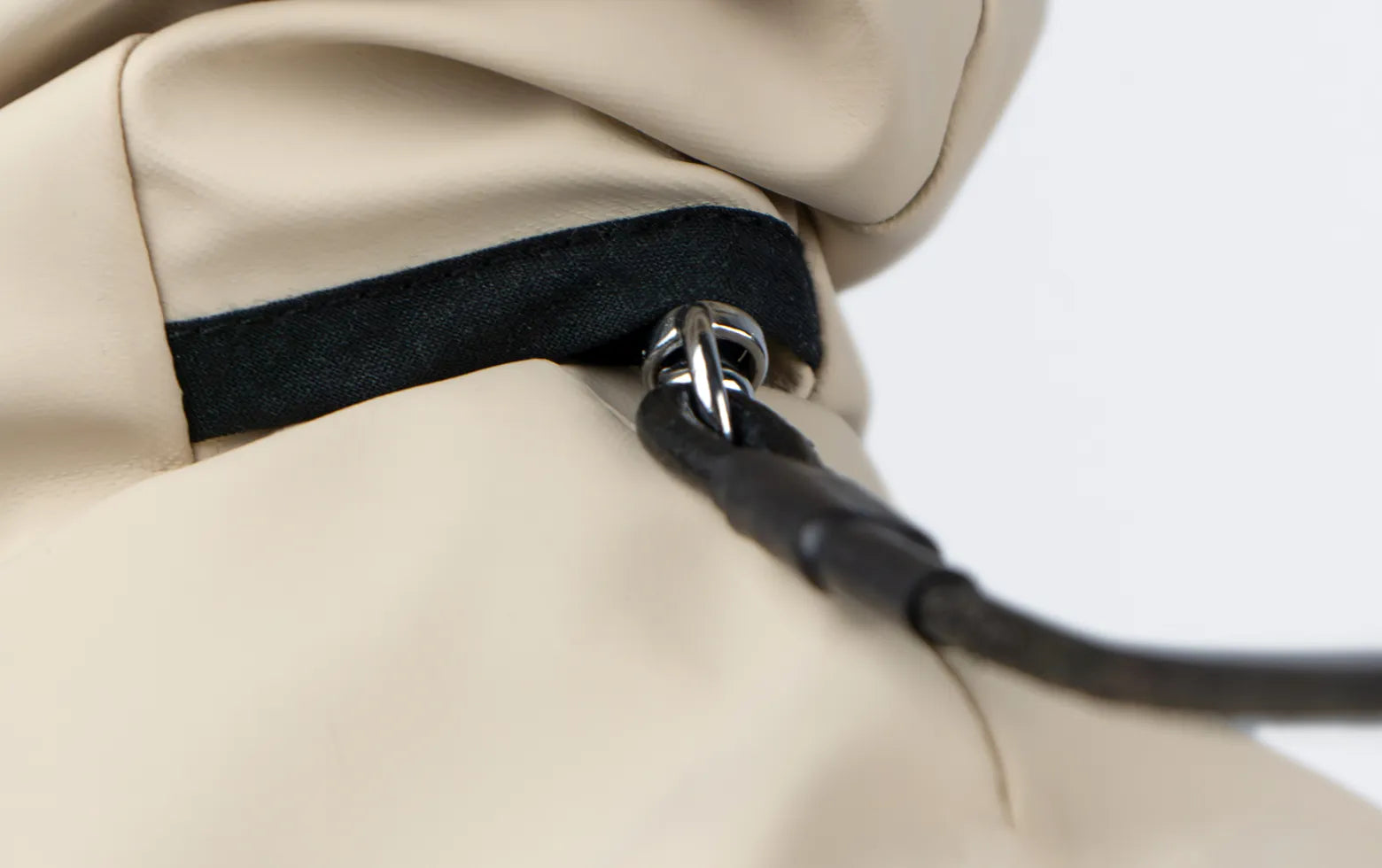 A closeup photo of a collar opening on a Italian Greyhound and Whippet raincoat by Strela Studio